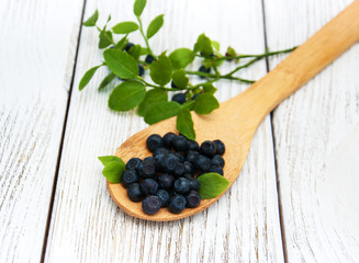 Blueberries on a old wooden background