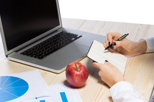 Business woman in an office holding red apple - Clipping Path