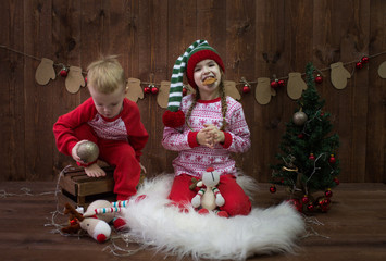 happy family children brother and sister, at Christmas