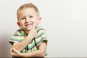 Fototapeta premium Little boy have fun with funny gestures