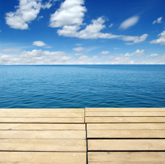 Obraz na płótnie Canvas Wood, blue sea and sky