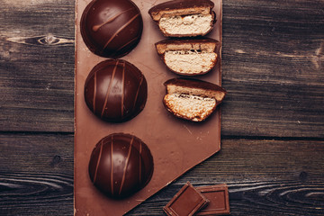 cake with chocolate icing and tile of milk chocolate