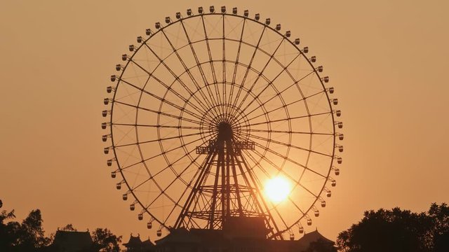 Ferris wheel at sunset. Vietnam.
