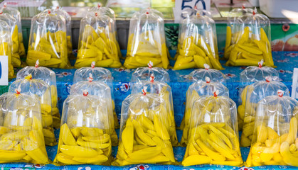 Mango marinade in plastic bags ready for sale.