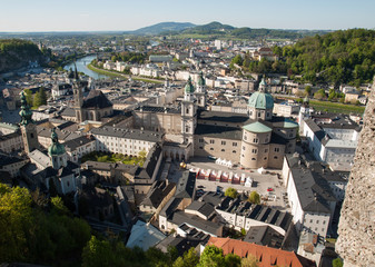 Fototapeta premium Top view of the Salzach river and the old city in center of Salzburg, Austria, from the walls of the fortress / Festung Hohensalzburg /