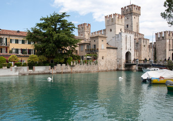 Medieval castle Scaliger in old town Sirmione on lake Lago di Garda. Italy