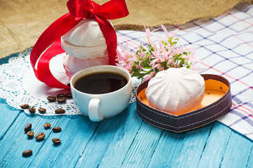 Obraz na płótnie Canvas Cooked black coffee with sweet marshmallow
