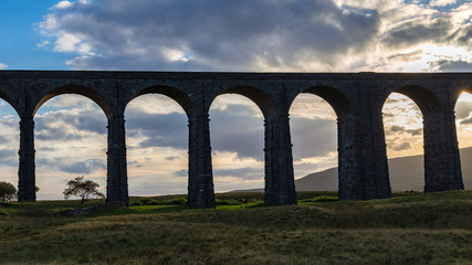 Fototapeta premium Ribblehead Viaduct in the evening, near Ingleton, Yorkshire Dales, North Yorkshire, England, UK