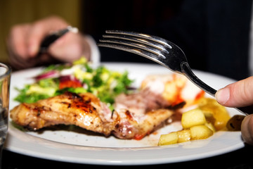Rabbit leg with apple confit and vegetable salad