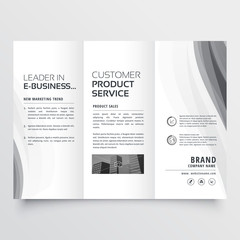 tri-fold business brochure with elegant gray wave