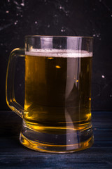 Beer on wooden background
