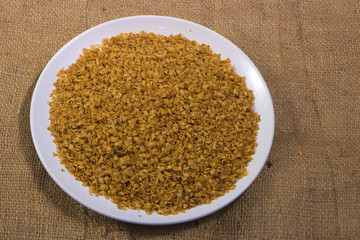the composition of the flakes of buckwheat on a plate