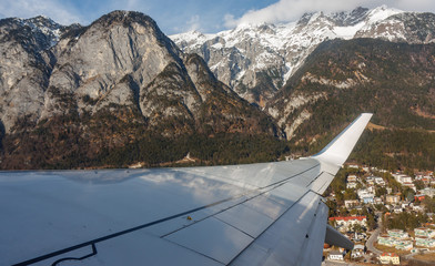 Airplane wing in the mountains