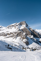 Winter in Swiss alps on a sunny day during a freeride session