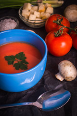 tomato soup on a dark background