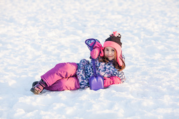 Fototapeta na wymiar Girl on the snow