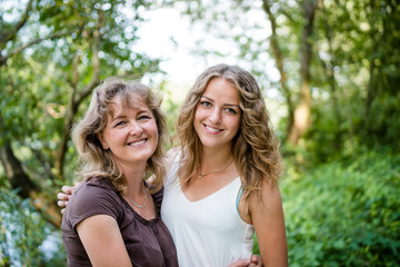 Portrait of happy loving mother with daughter
