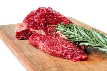 beef with rosemary on a white background