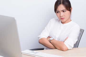 Serious woman use the computer