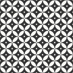 seamless minimalistic monochrome pattern of ovals and dots.