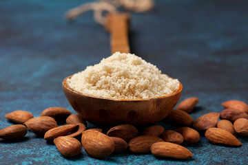 almond flour in a wooden spoon