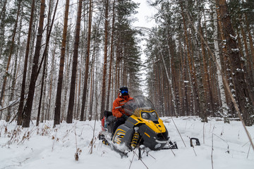 Athlete on a snowmobile