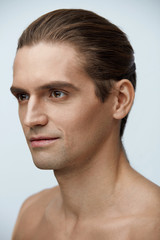 Obraz premium Skin And Body Care. Handsome Young Man With Clean Healthy Skin