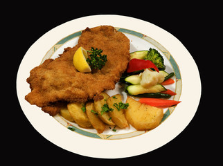 Wiener Schnitzel with potatoes and vegetables