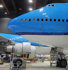 nose of a big blue airplane 