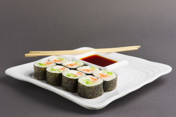 roll with salmon on plate