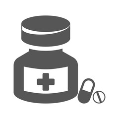 Medicine bottle and pills.