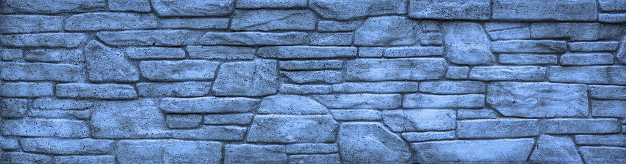Blocks of hard blue stone, weathered, uneven wall background.The texture of solid stone,The texture of solid stone, interior home construction