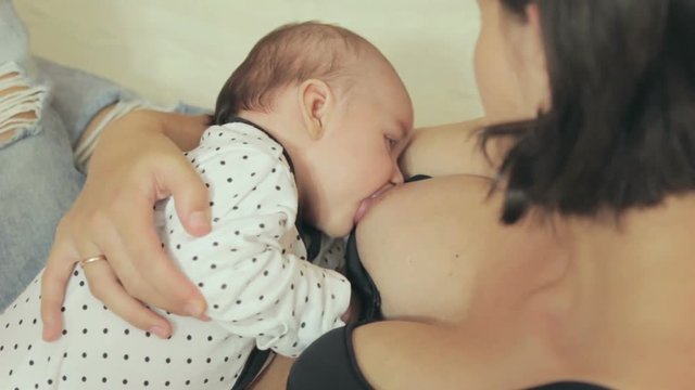 Mother breastfeeding her baby
