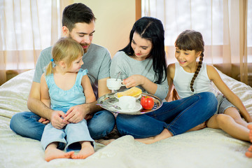 family breakfast in the hotel room