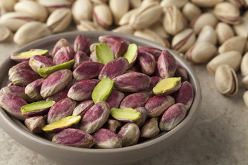 Bowl with unshelled pistachio nuts