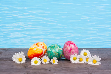 Obraz na płótnie Canvas Easter in pool, wellness and relax. Eggs and water background for party and spa
