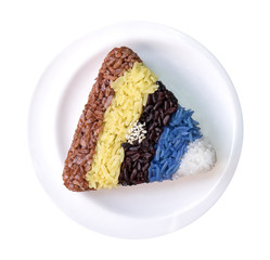 Colourful rice triangle shape in ceremic dish isolated on white background