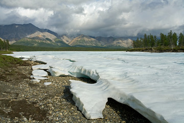 The remnants of last year the ice in the valley of the creek. Omulewska the Midlands. Yakutia....