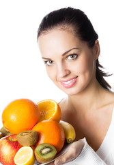 woman with plate of fruits