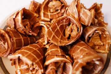 Homemade waffles with condensed milk. Traditional Russian dessert