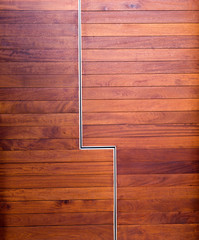 Varnished pine wood door with asymmetric detail