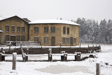 Fototapeta na wymiar The buildings of the medieval city in winter
