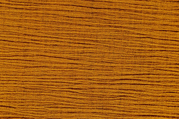 Gold ochre crinkled material background texture