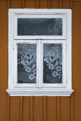 Window as the main object of fragment of the old rural house, in front, Ukraine