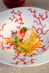 A unique gourmet shrimp dish, with apples, peaches and mandarin slices. Sweet seafood cuisine.