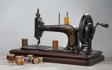 Vintage sewing machine with scissors and cloth
