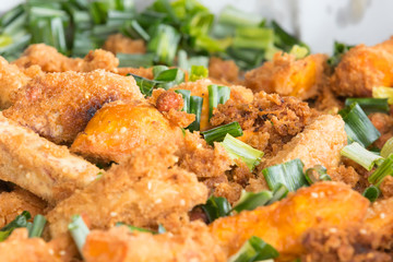 fried chicken in breadcrumbs with chives