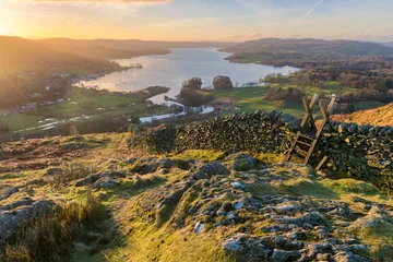 Foto op Canvas Lake Windermere in the English Lake District taken at sunrise with vibrant colours and golden morning light. © _Danoz