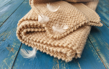 Soft warm blanket on a wooden surface