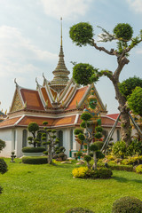 Naklejka premium Decorative gardens and front gate to Wat Arun Temple in Bankgkok, Thailand